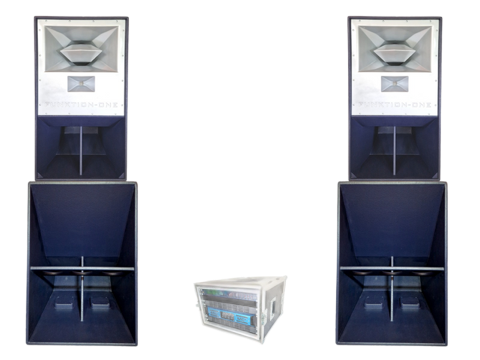 Three speaker boxes on white background, two tall black speakers flanking a small silver unit.