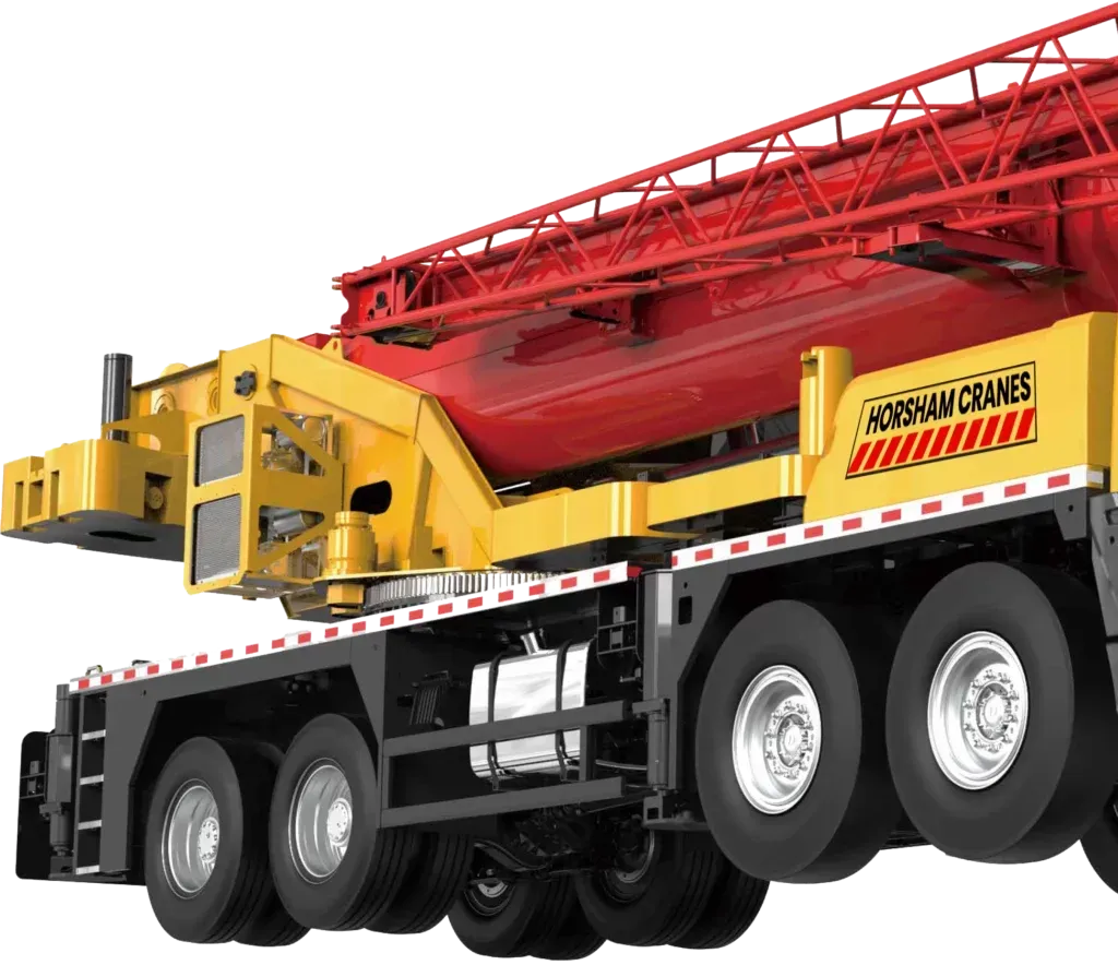 Red and yellow construction crane with multiple wheels, labeled