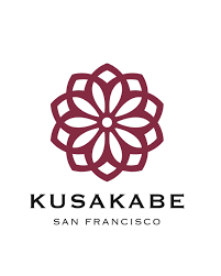 Kusakabe San Francisco logo with burgundy floral emblem above black text on white background