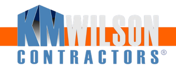 KM Wilson Contractors logo in blue and gray text