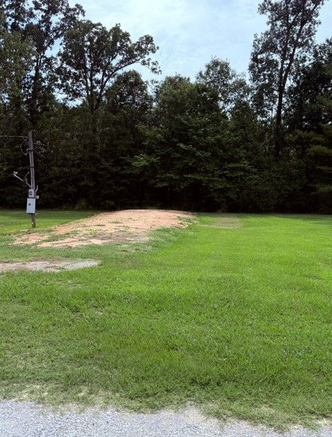 Peaceful residential street at Hickory Lane mobile home park