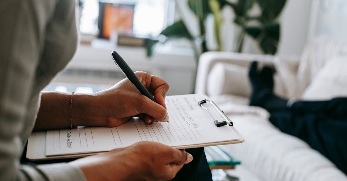 Person taking note writing on a
