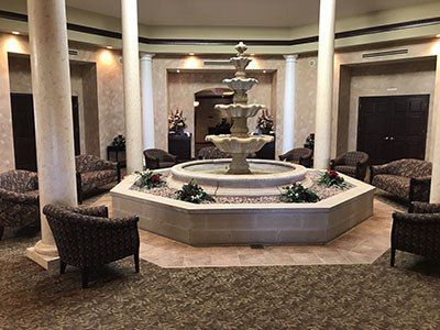 there is a fountain in the middle of the room.