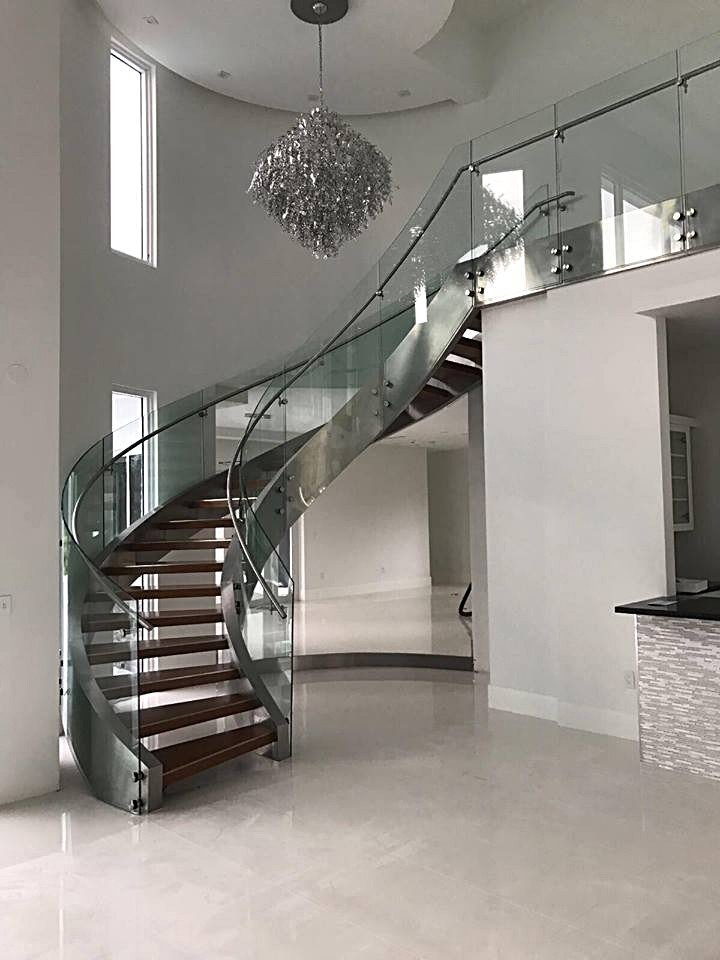 spiral staircase with glass railing