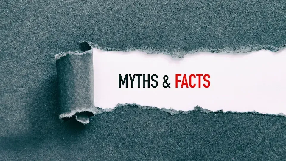 A piece of torn paper with the words `` myths & facts '' written on it.