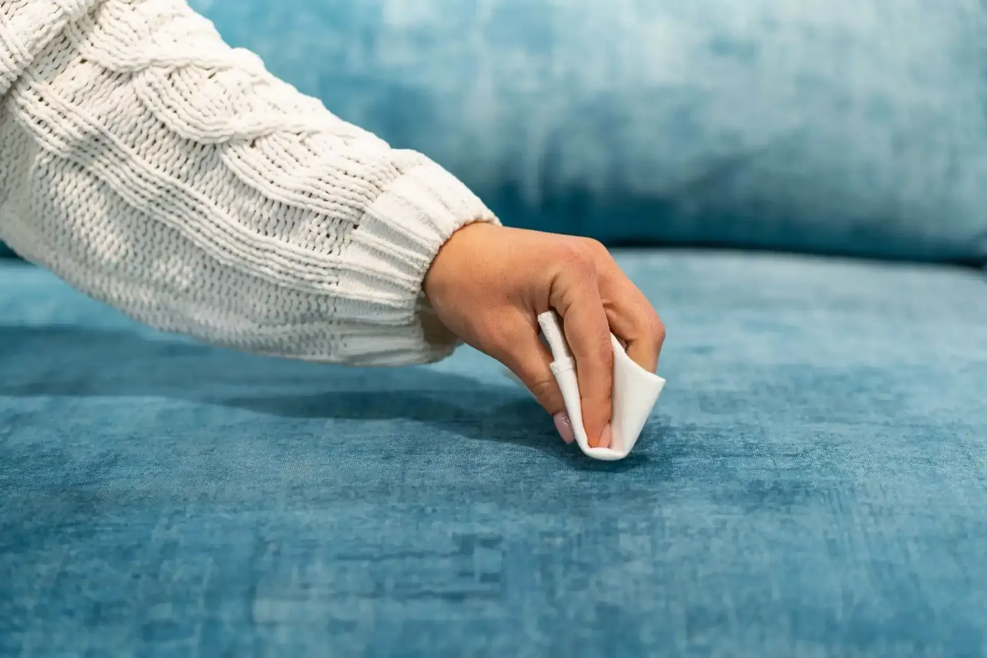 Person blotting a stain