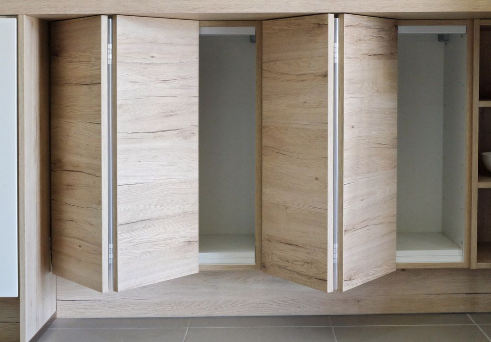 Kitchen Cabinet Storage — Cabinetry In Cessnock, NSW