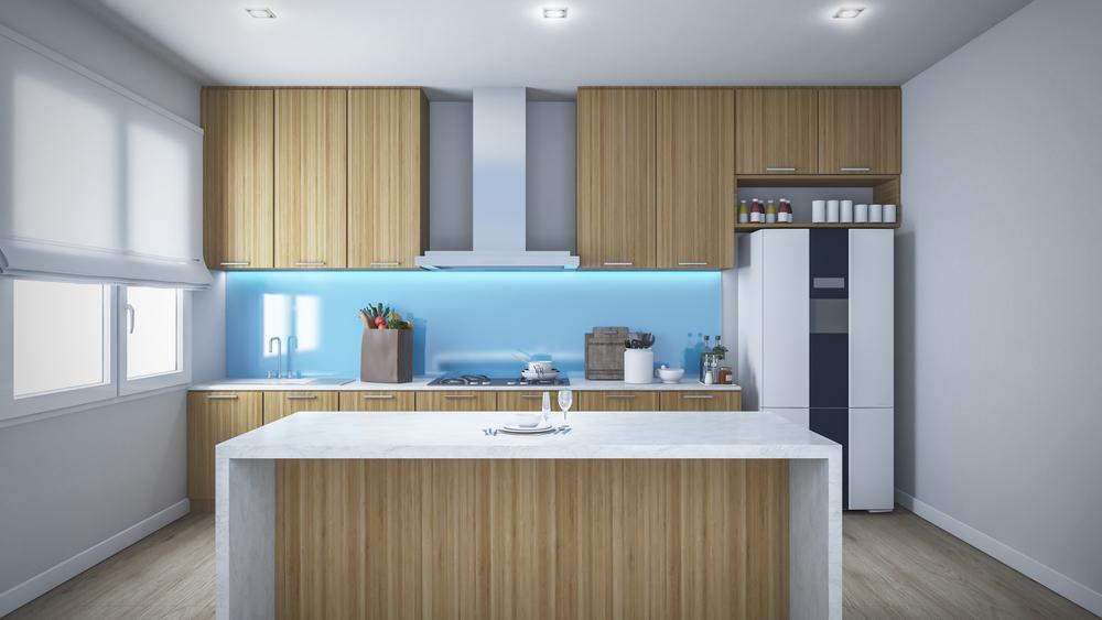 Blue Themed Kitchen With Wooden Style Cabinets — Cabinetry In Cessnock, NSW