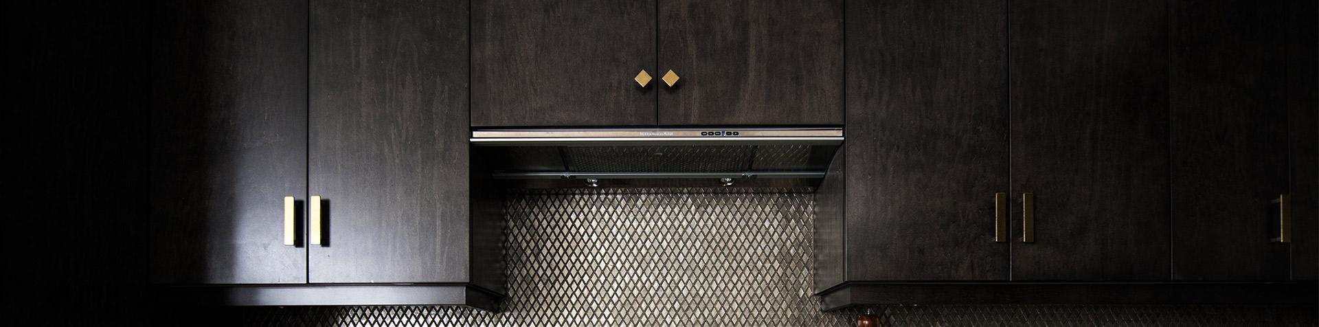 Stylish Black Kitchen Cupboards — Cabinetry In Carrington, NSW
