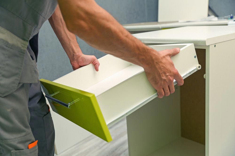 Man Assembling Kitchen Drawer