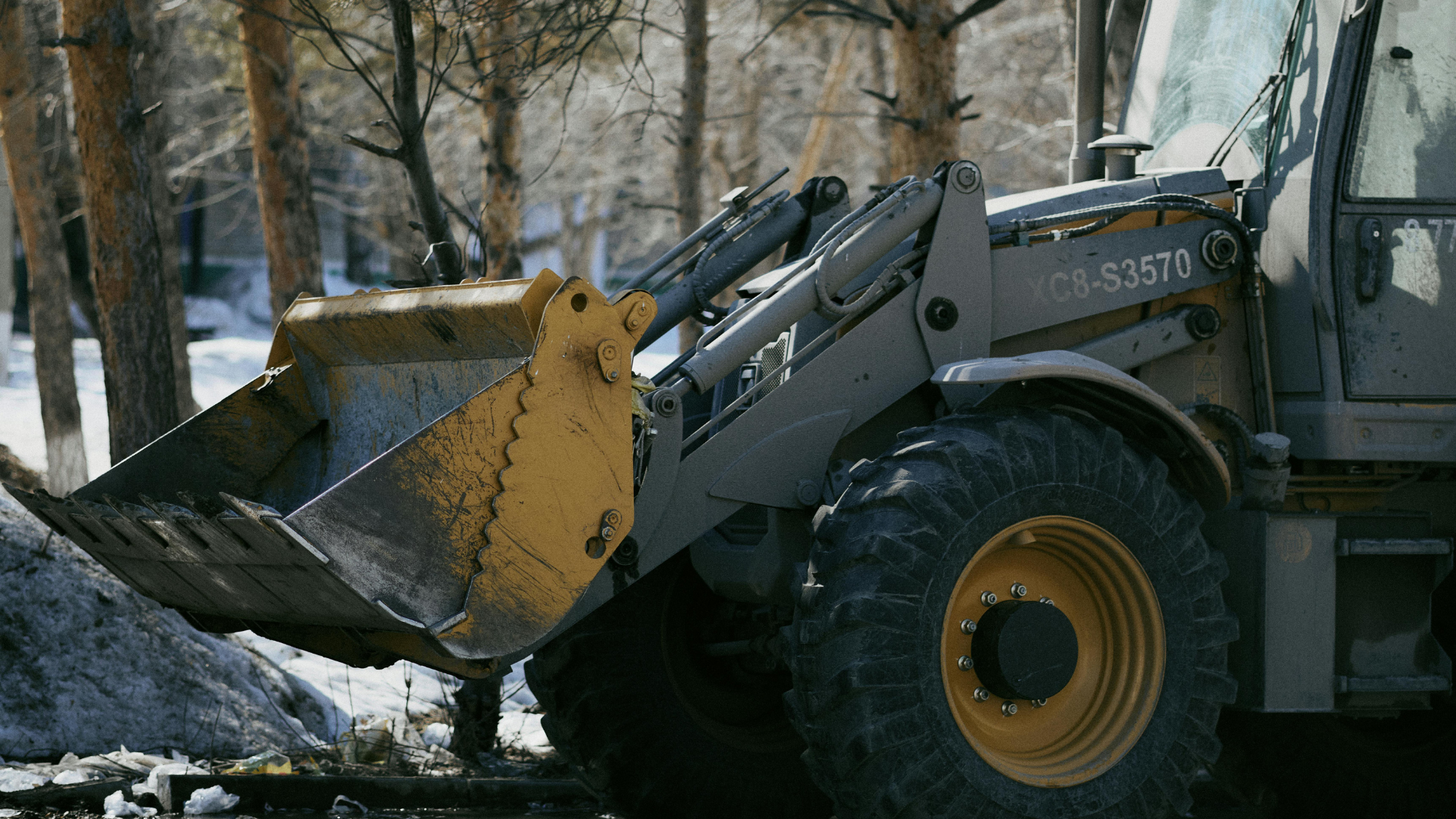 Excavator completing structural demolition at a Hanford property
