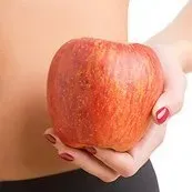Holding an Apple — Garden City, NY — Integrative Medicine of New York, PLLC Holding an Apple — Garden City, NY — Integrative Medicine of New York, PLLC