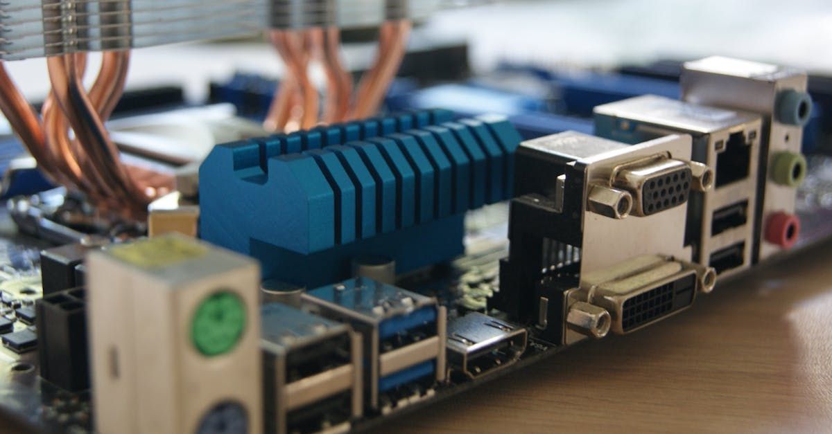 A close up of a computer motherboard with a lot of ports