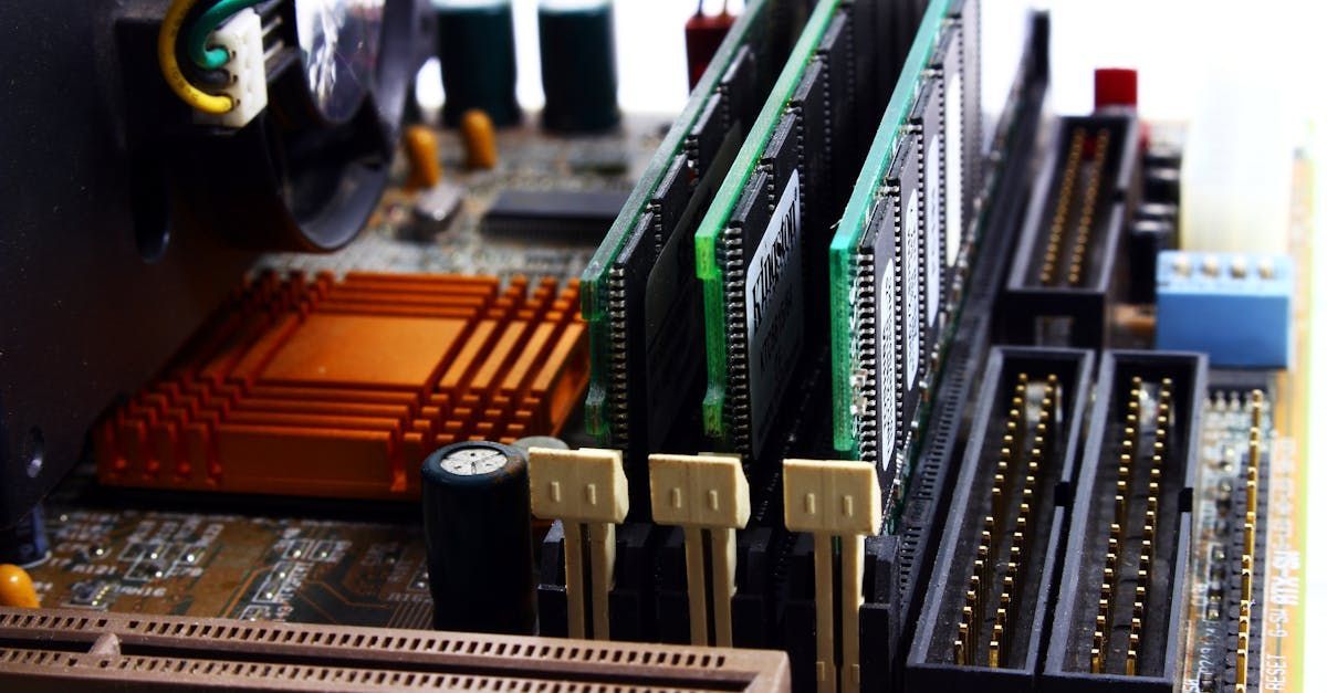 A close up of a computer motherboard with ram slots