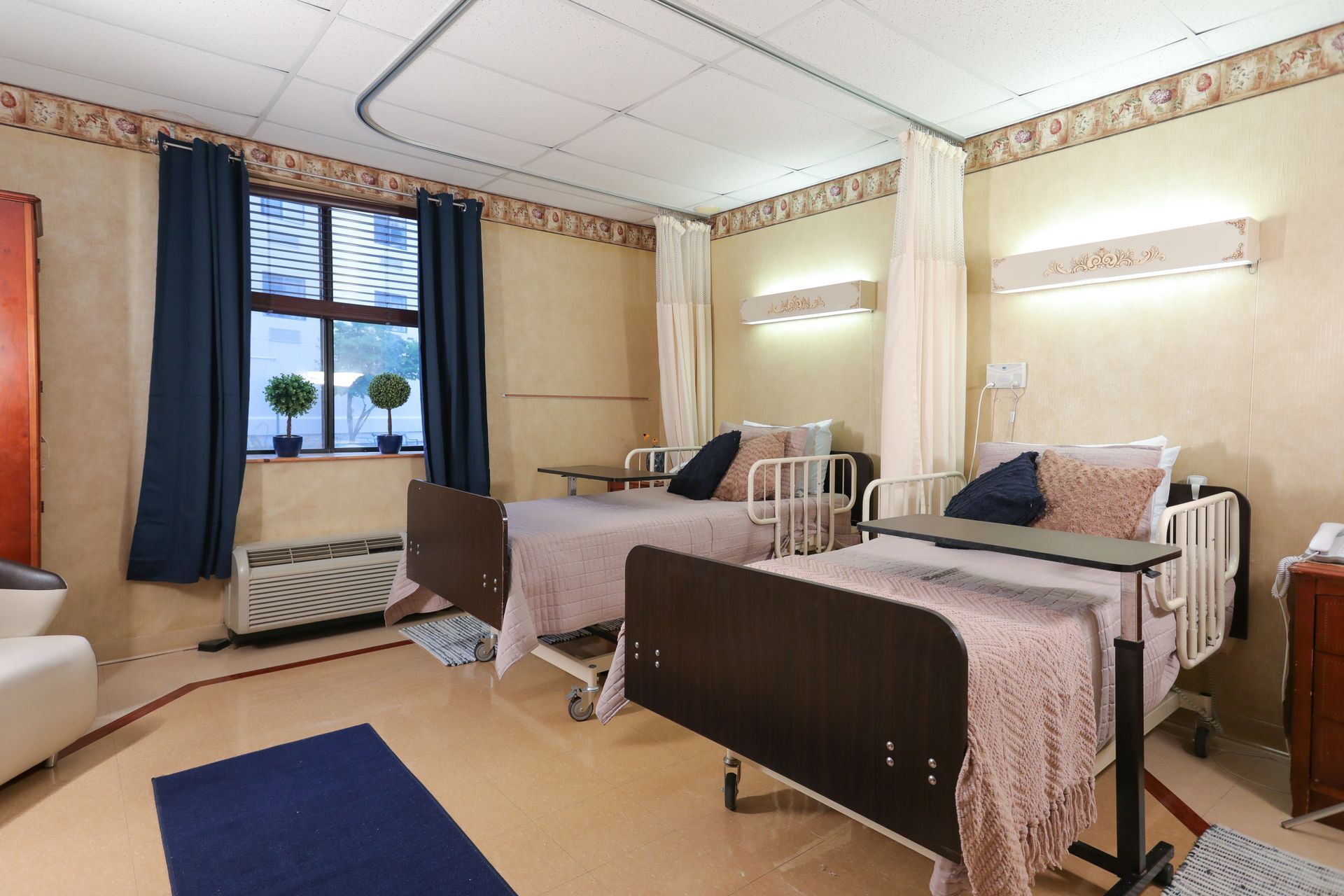 Semi-private resident room at AristaCare at Cedar Oaks skilled nursing facility