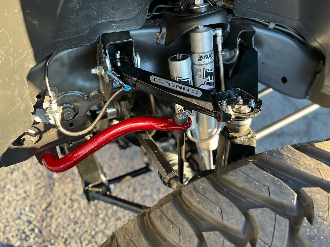 A close up of a suspension system on a truck
