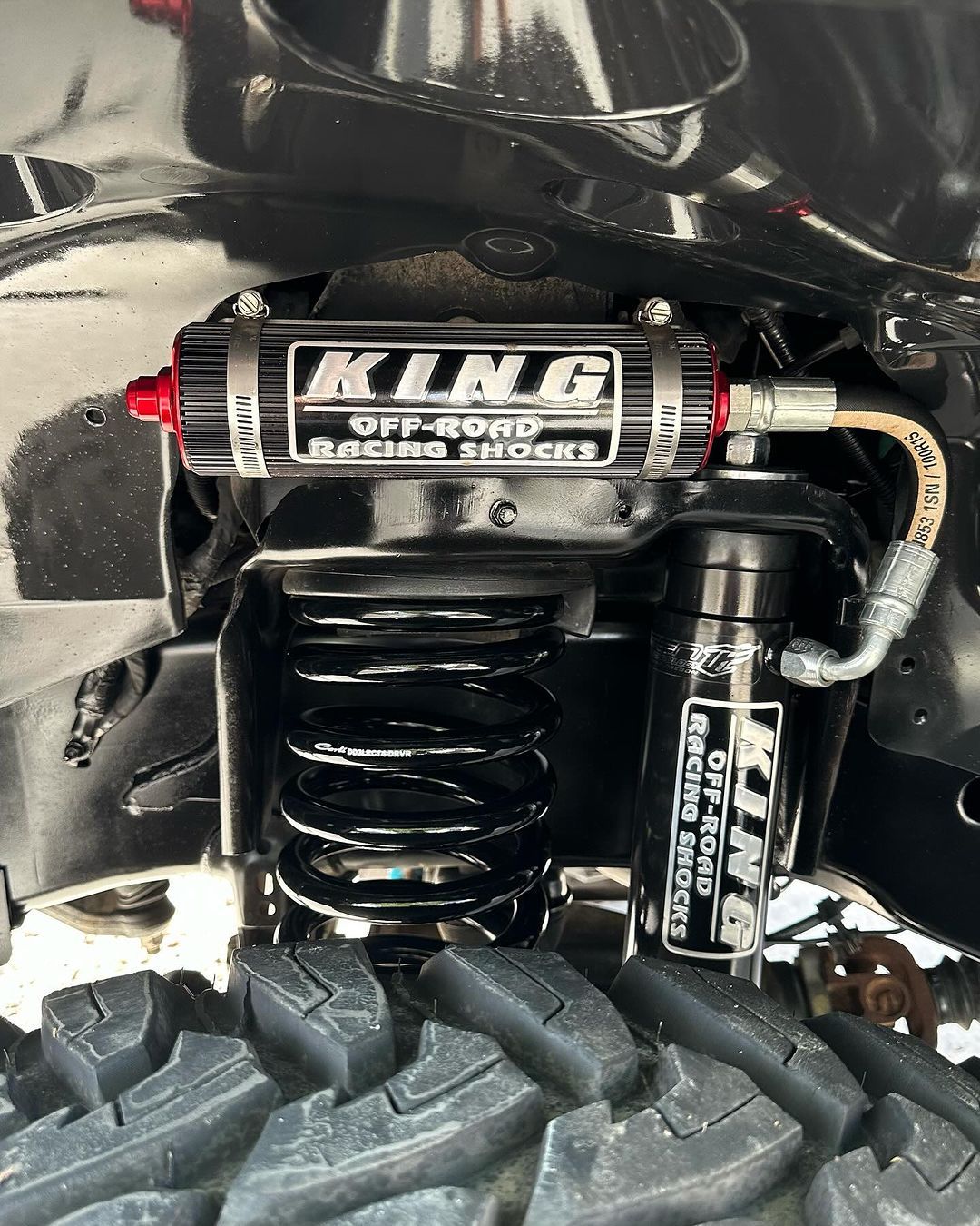 A close up of a king shock on a truck