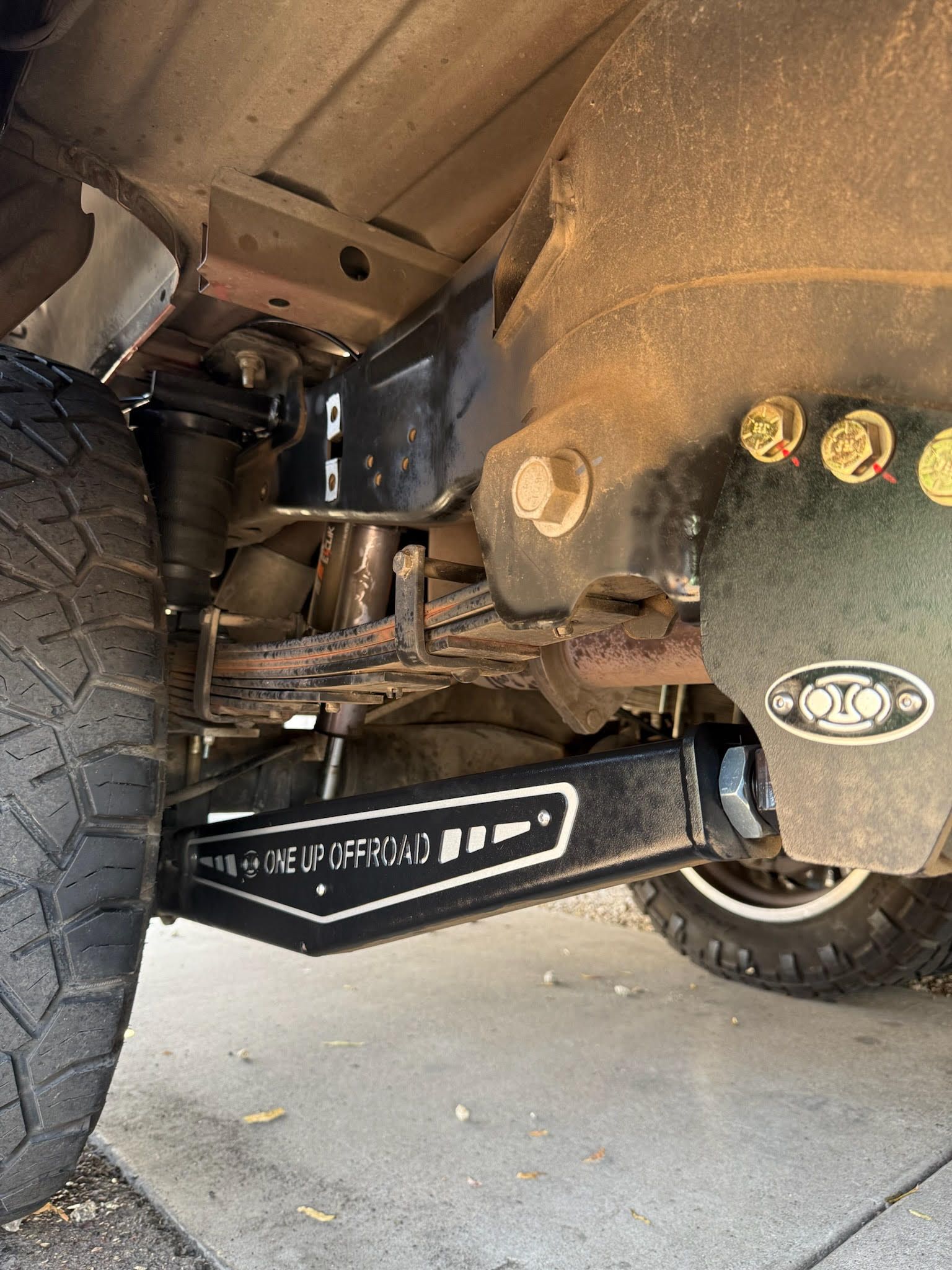 A close up of the underside of a truck.
