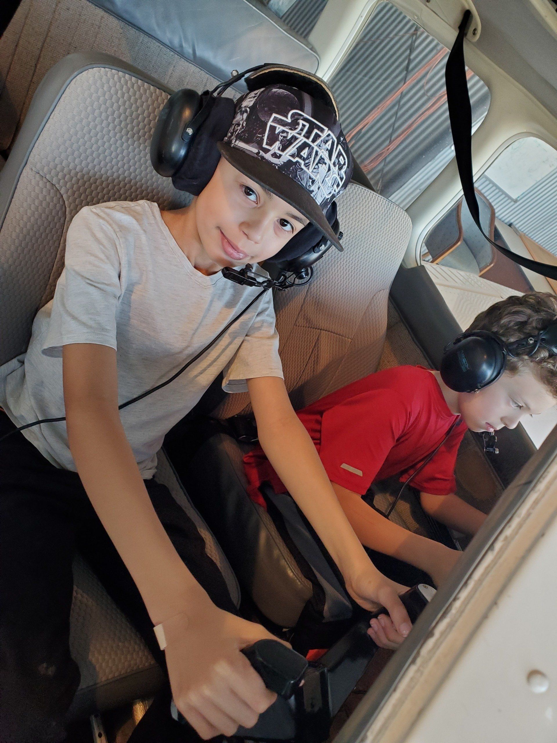 Two Kids Inside Aircraft — Bloomington, IL — Tailwind Waymakers