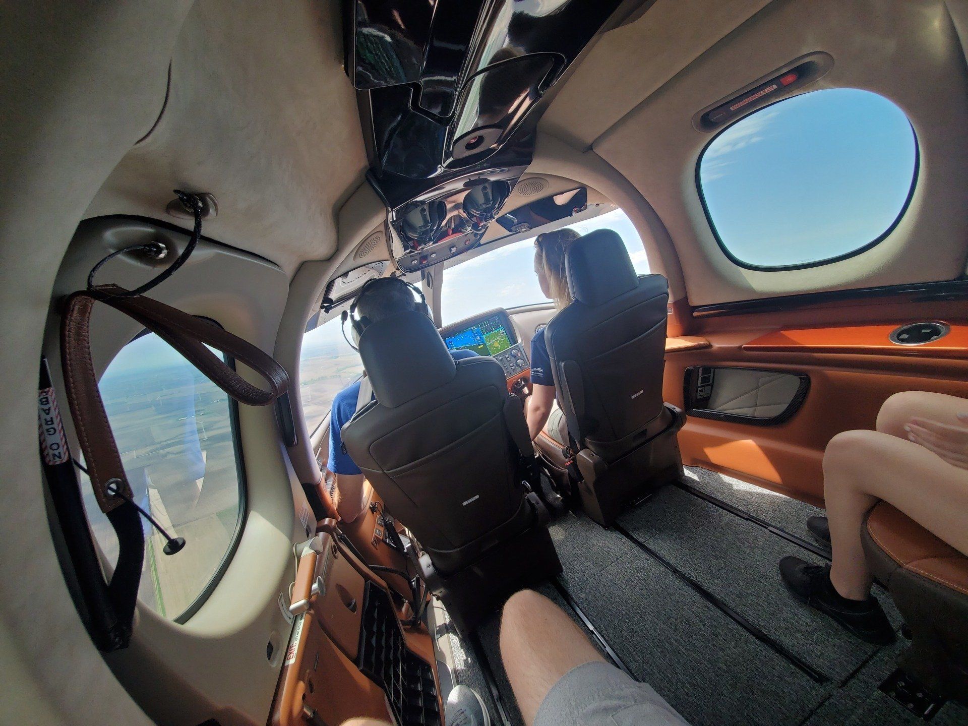 Pilot And Woman Inside The Amazing Aircraft — Bloomington, IL — Tailwind Waymakers