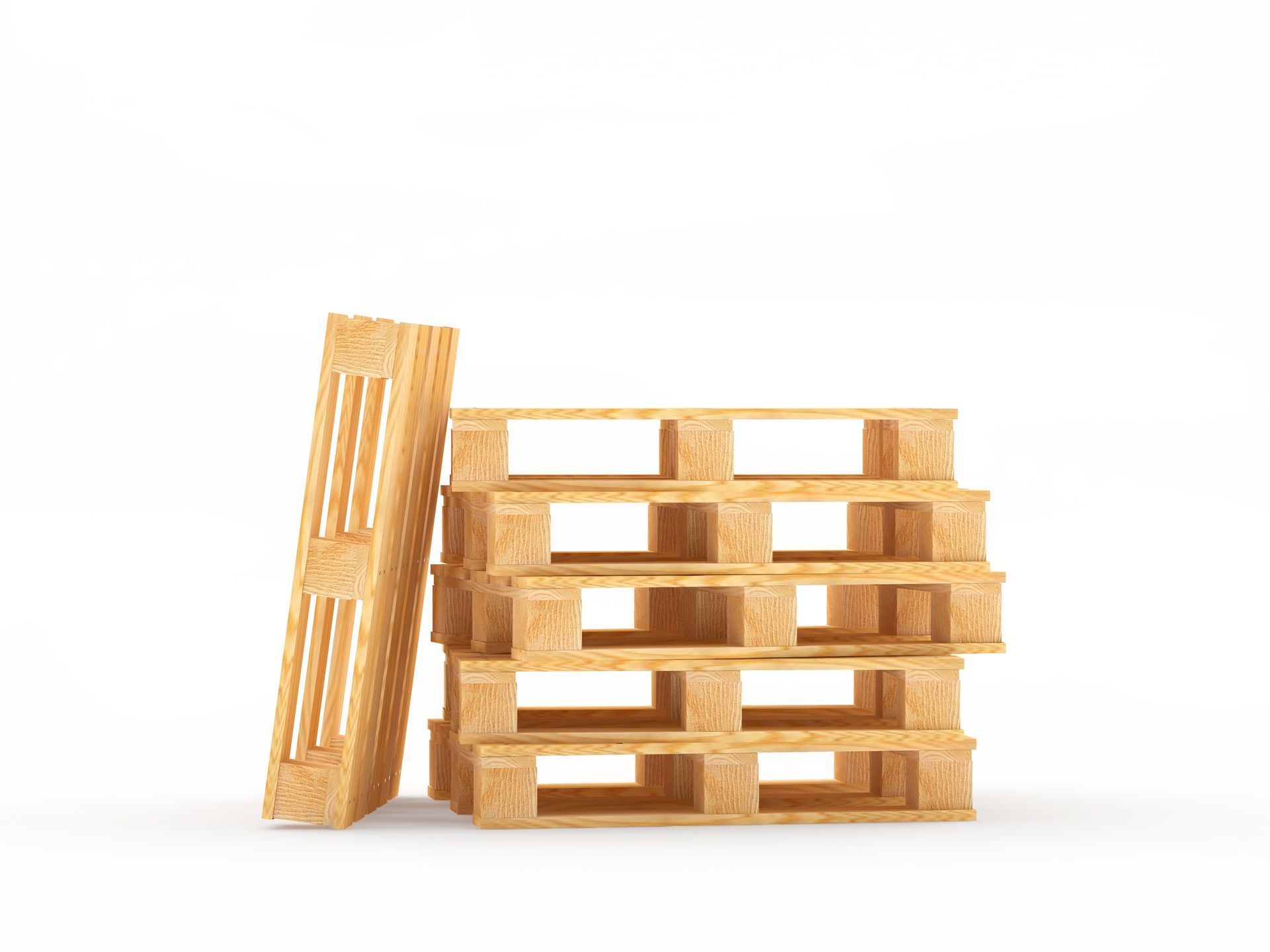 Stacked wooden pallets, with one leaning against the pile on a white background.
