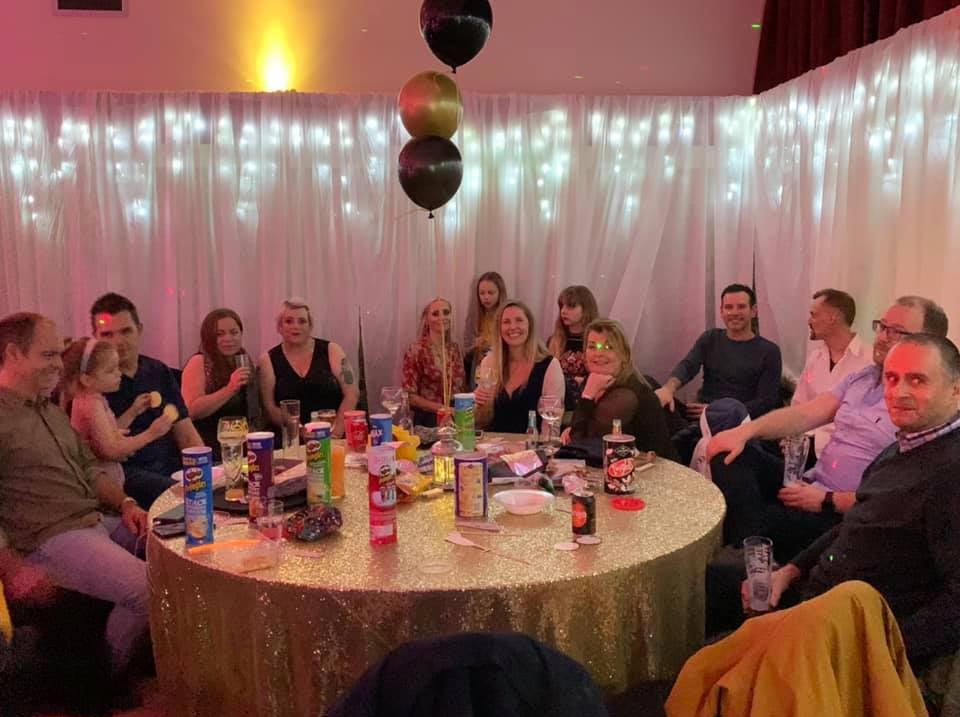 People at a party at Longueville Hall