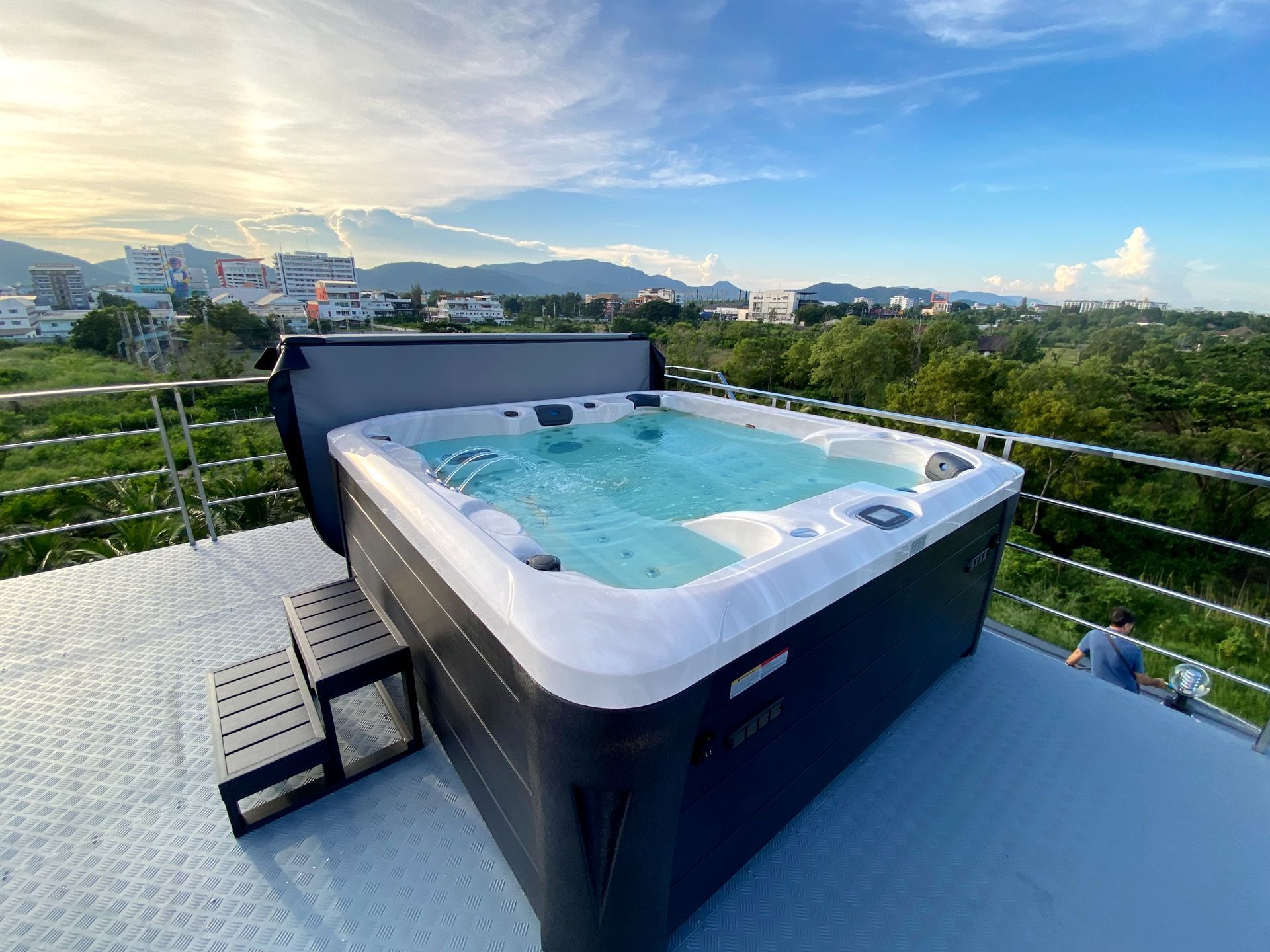 Family-size Q&G outdoor hot tub on a rooftop terrace in Hua Hin, Thailand, with open sky views