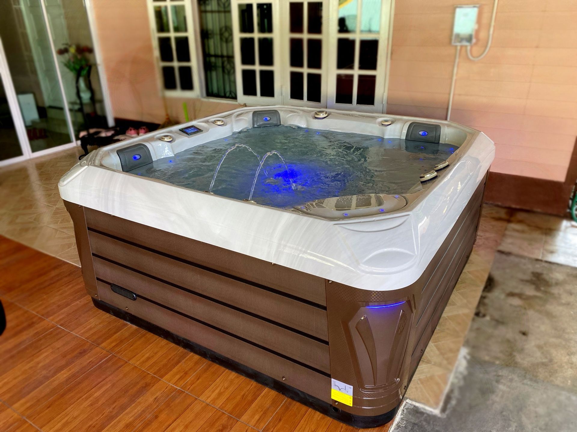 Q&G outdoor hot tub on a covered patio in Mae Chan District, Chiang Rai