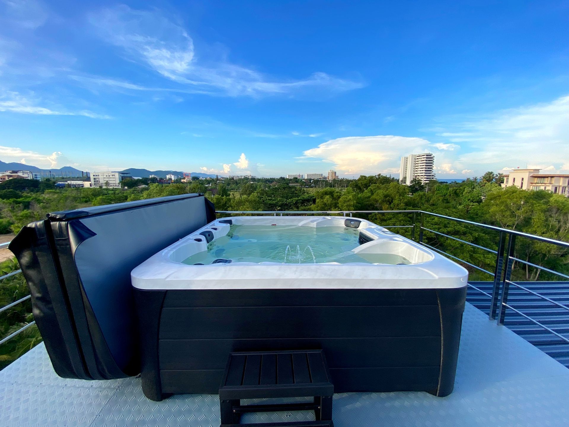 Q&G outdoor hot tub installed on an open rooftop terrace in Hua Hin, overlooking the surrounding area