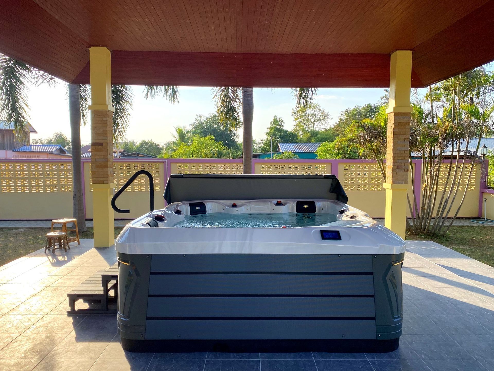 Q&G outdoor hot tub inside a side-yard pavilion in Wichian Buri District, Phetchabun