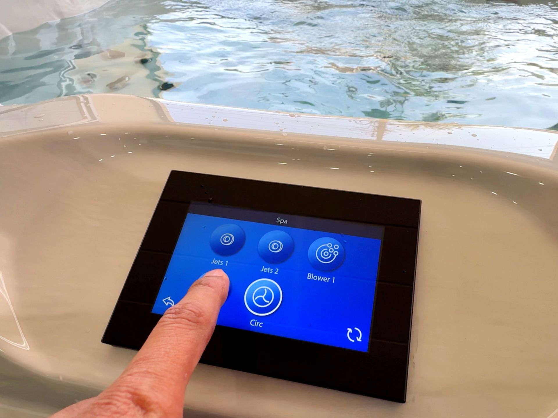 Touch screen panel of balboa demonstrating turn on jets for swim spa