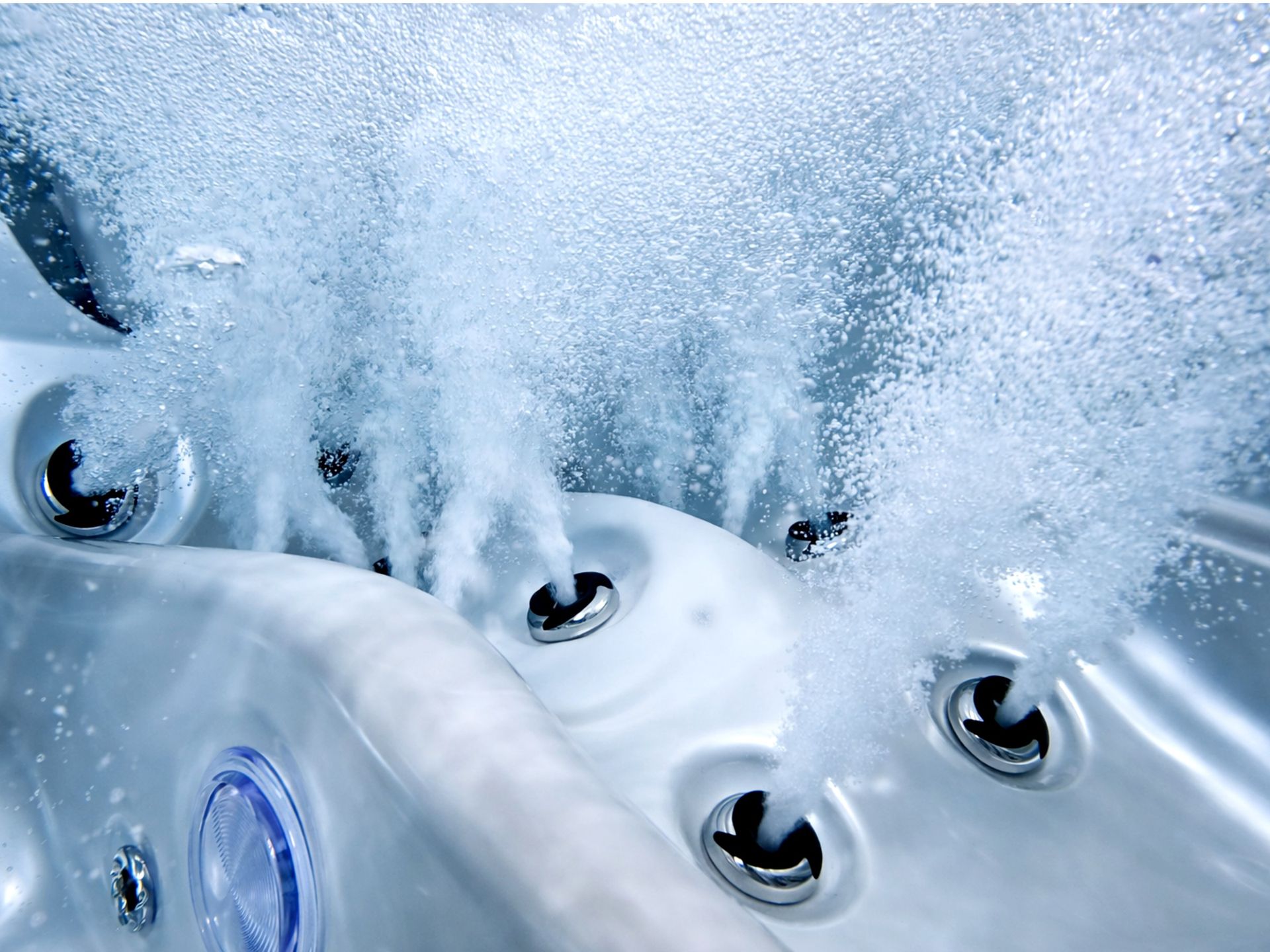 Powerful massage jet system in an outdoor hot tub showing water pressure performance and hydrotherapy quality for long-term value