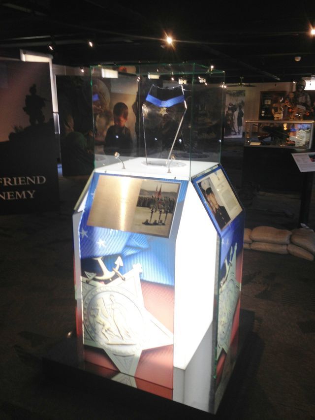 A display with a sign that says friend enemy