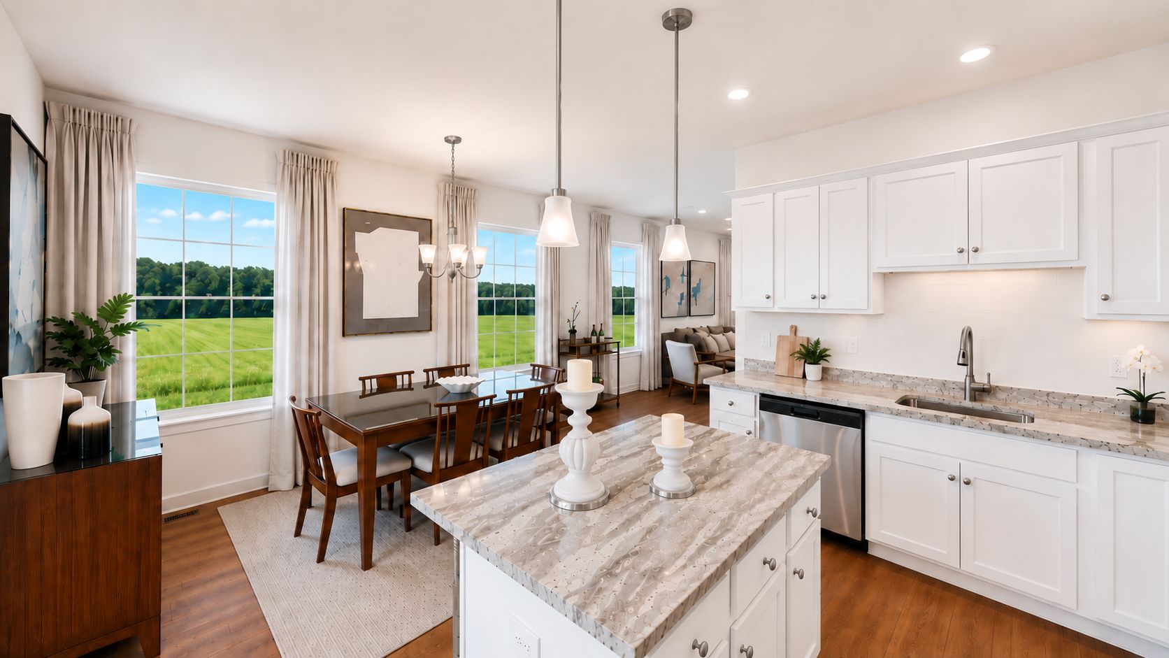 Open kitchen with stainless steel appliances, wooden cabinets, and polished hardwood floors leading to a dining room