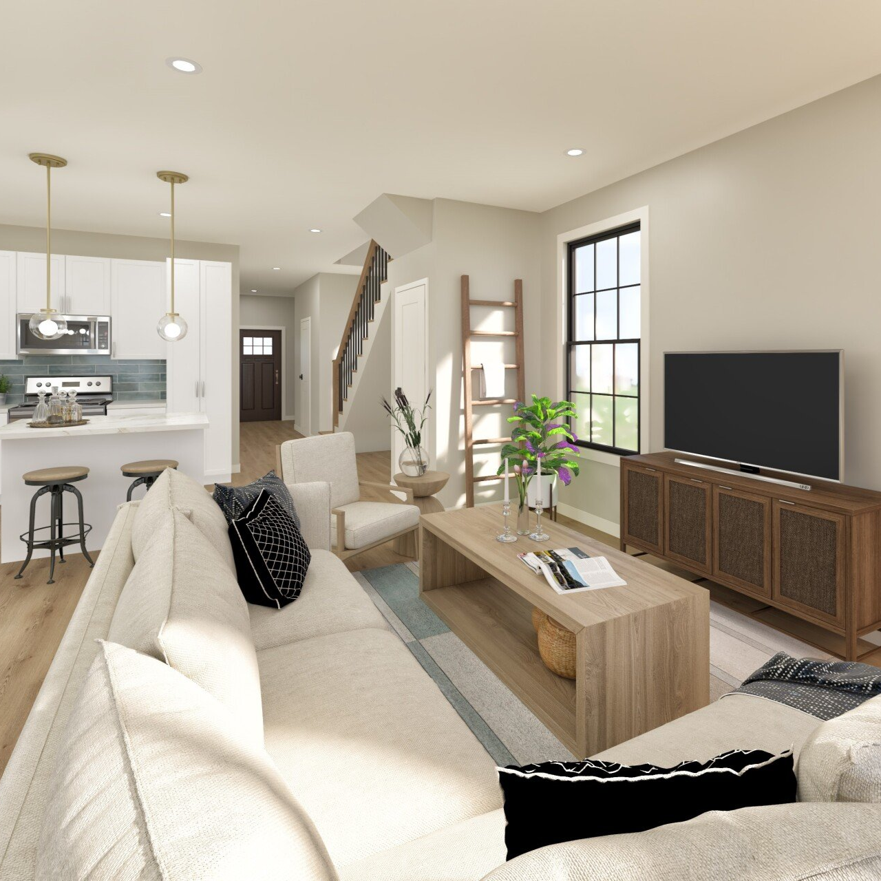 Bright modern living room with beige sofa, wood TV console, kitchen island, and large window.