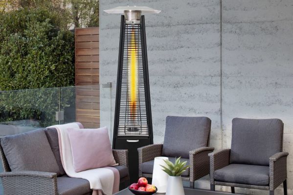 Patio Heater with An Orange Flame, Next to Outdoor Seating — Kuranda Gas & Supplies In Koah, QLD