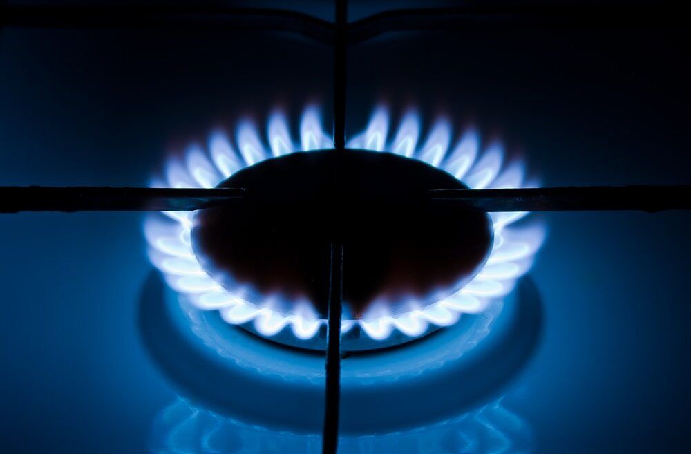 Burning Blue Gas Flames on A Stovetop — Kuranda Gas & Supplies In Cairns, QLD
