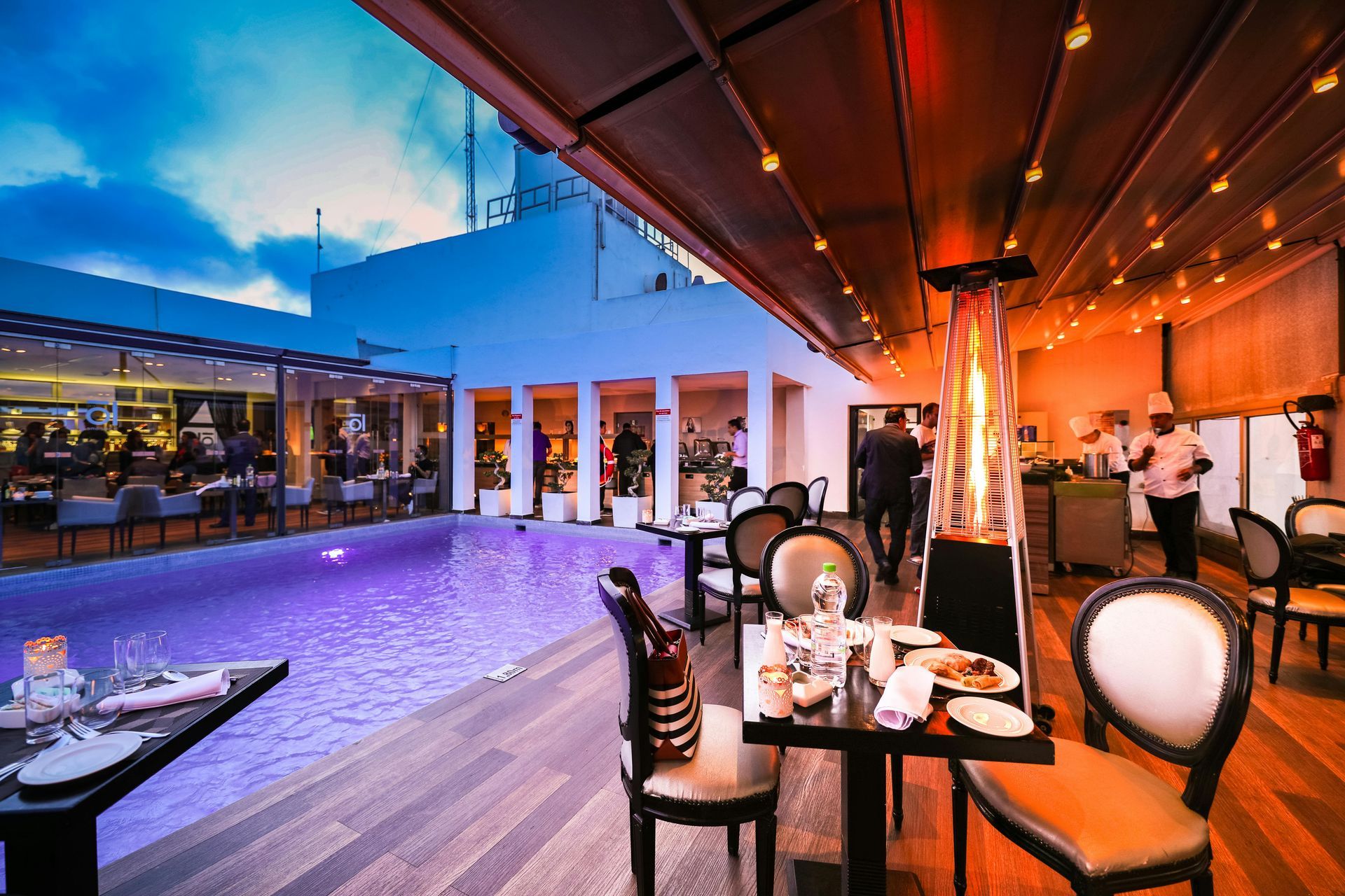 Rooftop Restaurant at Dusk with Pool — Kuranda Gas & Supplies In Koah, QLD