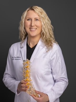 Man Checking The Patient Back — Acworth, GA — Elite Total Wellness Man Checking The Patient Back — Acworth, GA — Elite Total Wellness