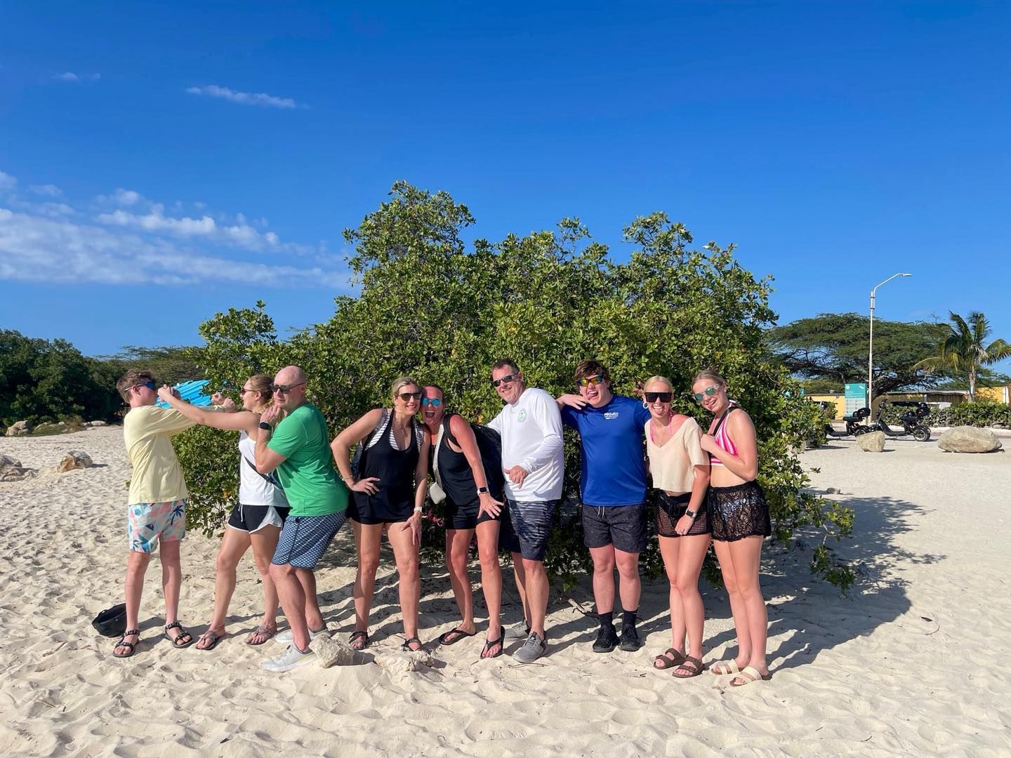 Group posing together during a Scootey Aruba outing