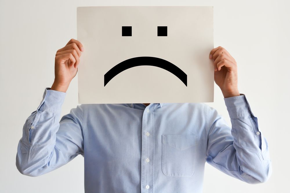 A man with a sad face