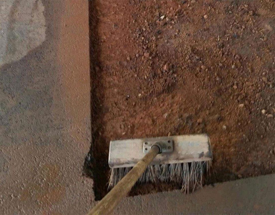 Brooming Of A Patch Prior To Asphalt Laying — Bitumen Services in Darwin, NT