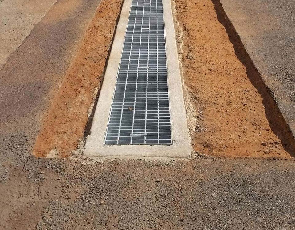Drain Preparation For Asphalt Patching — Bitumen Services in Darwin, NT