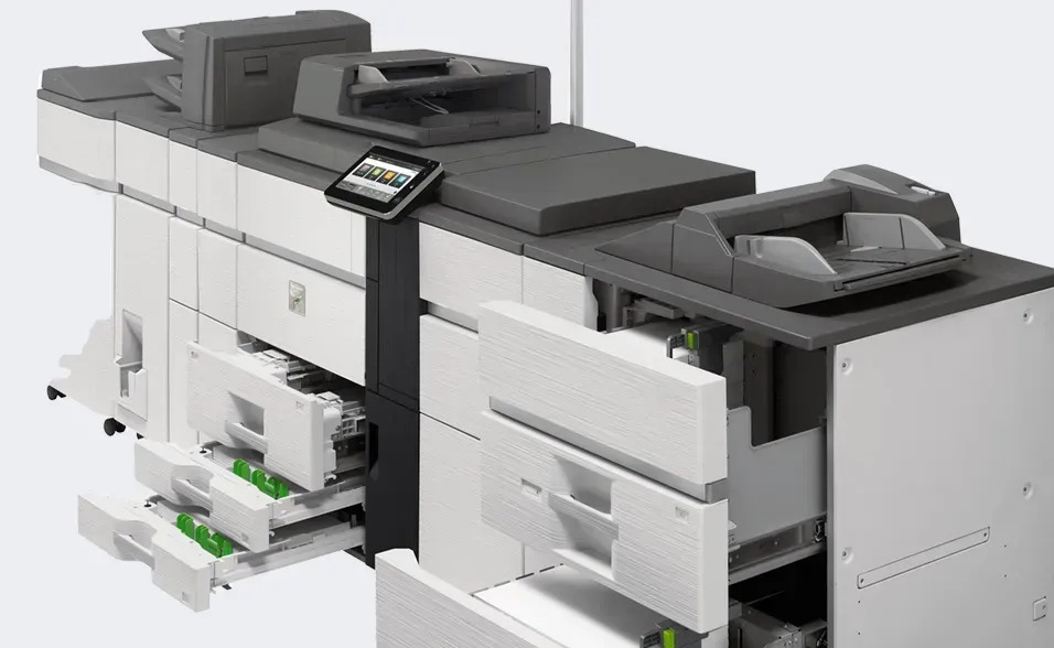 Large industrial printer with open paper trays and control panel.