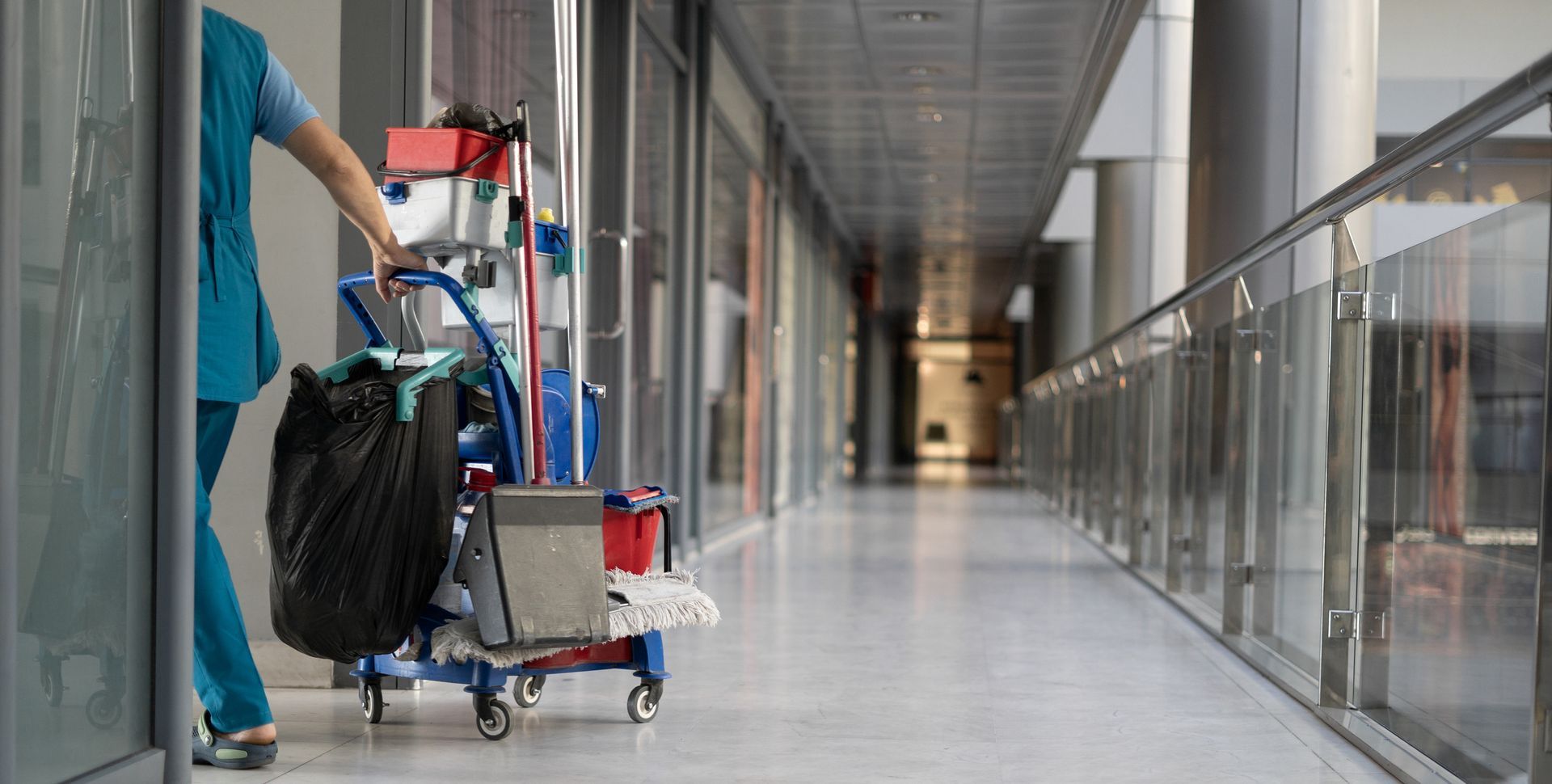 Employee Pulls A Trolley For Cleaning — West Palm Beach, FL — Maid Golden LLC Employee Pulls A Trolley For Cleaning — West Palm Beach, FL — Maid Golden LLC