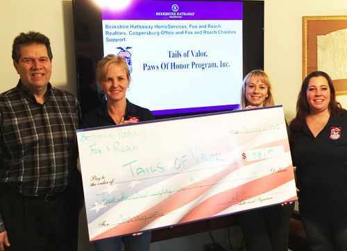 Tails of Valor, Paws of Honor Program. They are based in Coopersburg. A nonprofit which trains rescued dogs for Veterans that need companions. This is Randy Hughes, Heather Lloyd, Christine Acera and Janna Spess.