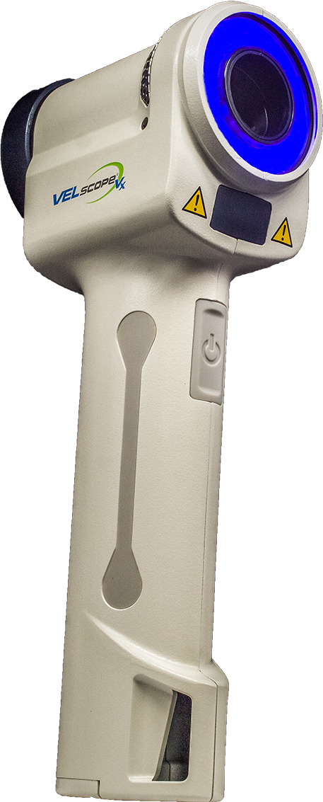 Handheld digital inspection device with a blue circular front lens and white body