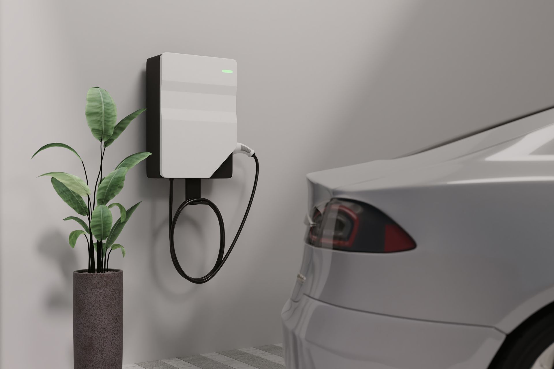 Electric car charging station on a wall with a cable connected to a silver car.