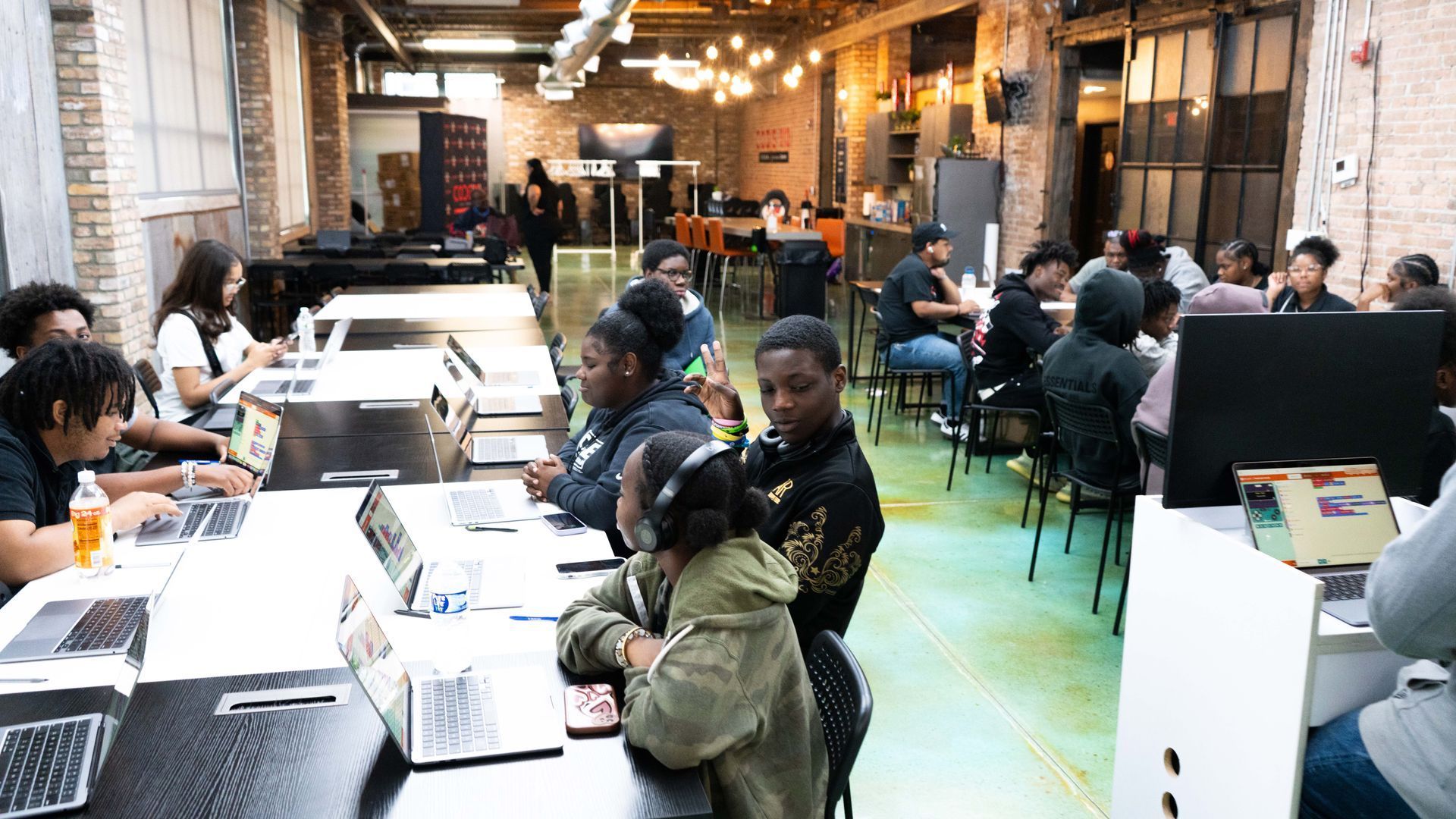 High school scholars coding together