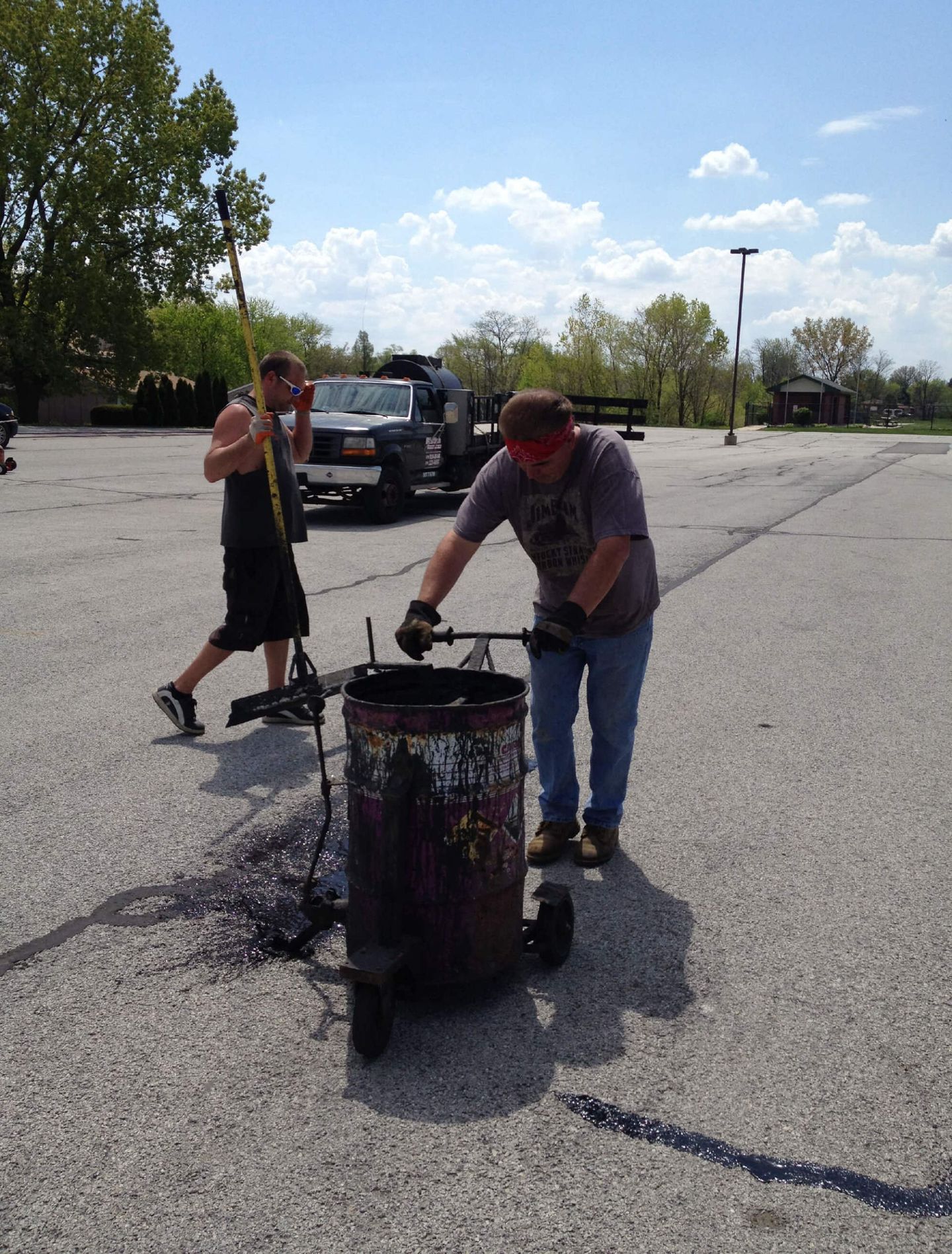 Men Repairing The Road — Schereville, IN — Ristich Asphalt Paving Inc